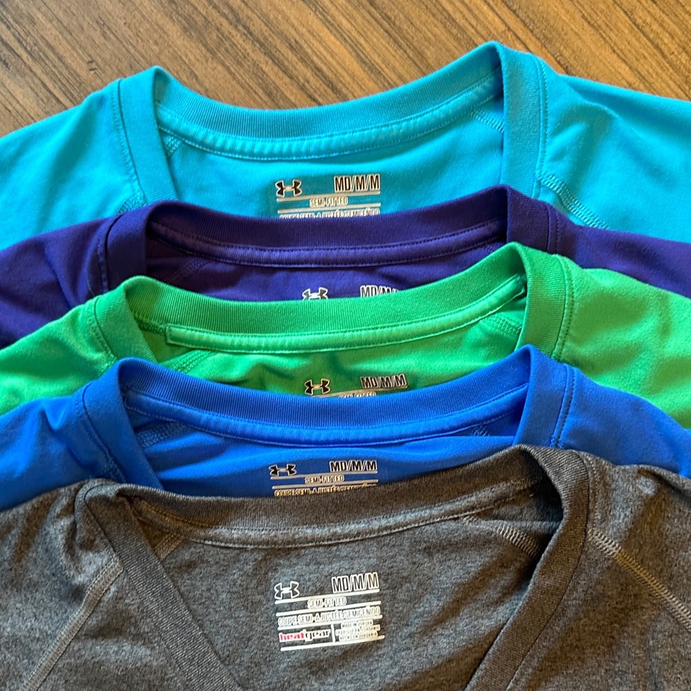 Under Armour semi-fitted heat gear.  5 tees, one low price